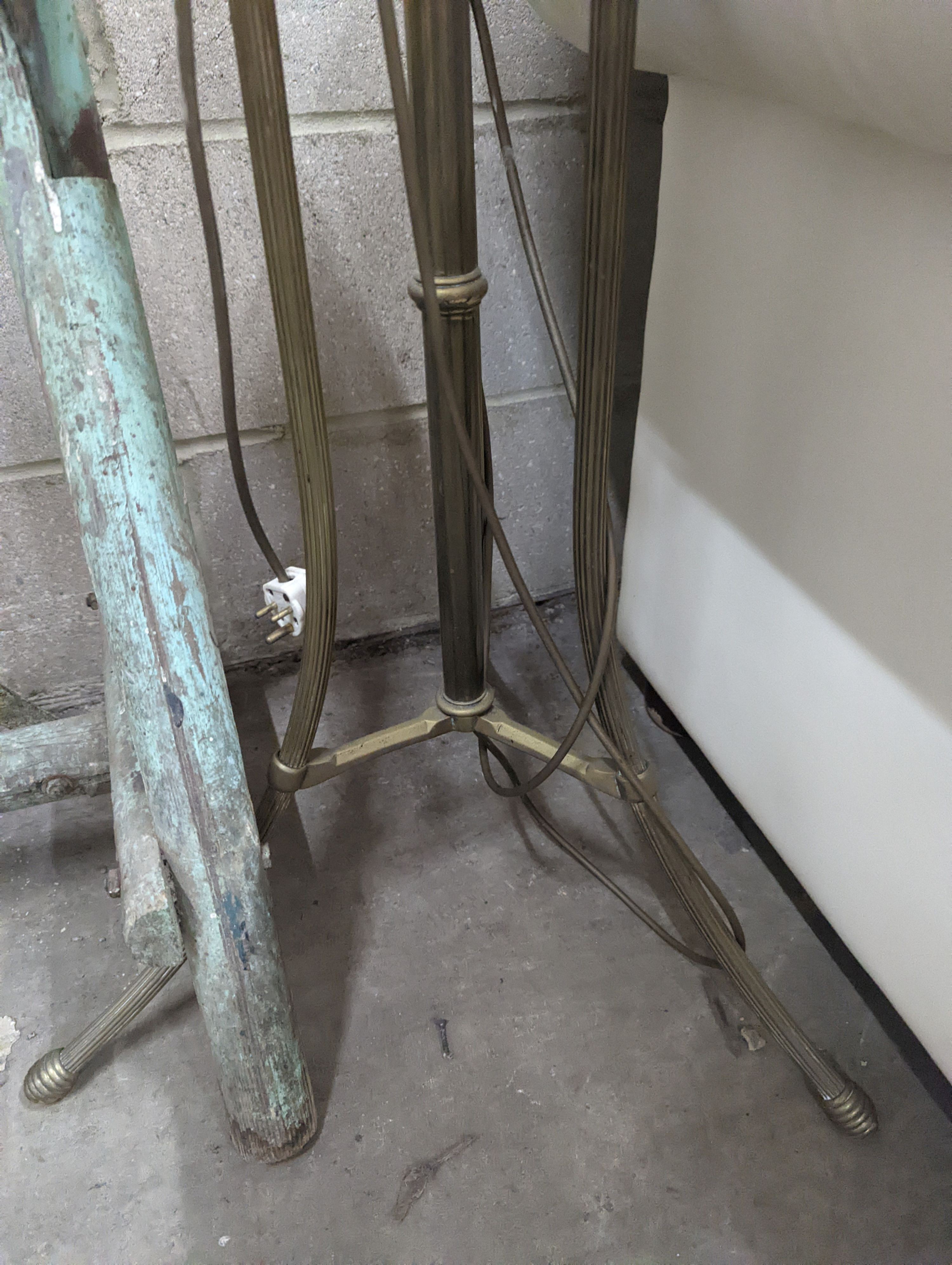 An early 20th century brass telescopic standard lamp
